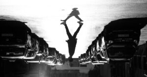 A striking silhouette of a person walking along a street in Rabat, Morocco.