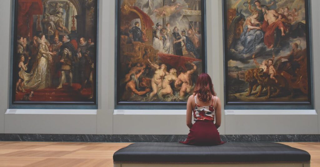 A woman observes classic paintings in an elegant museum gallery.